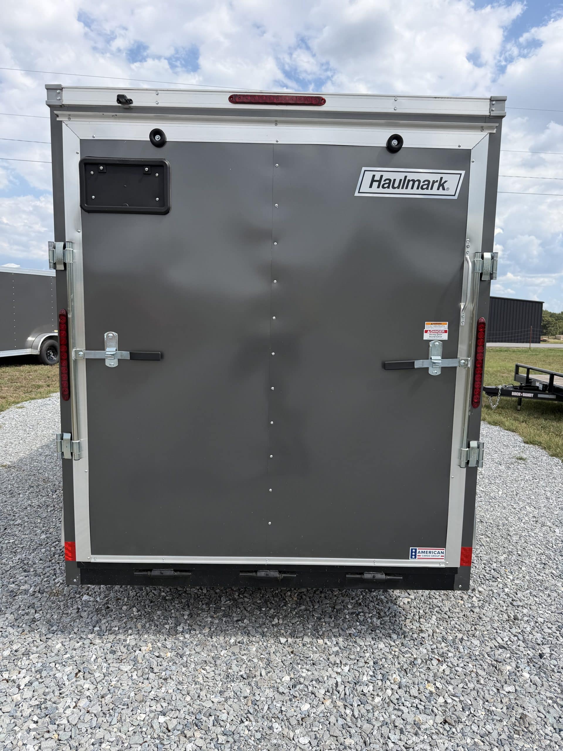 Rear view of a 2026 Haulmark 6 x 12 trailer in charcoal color